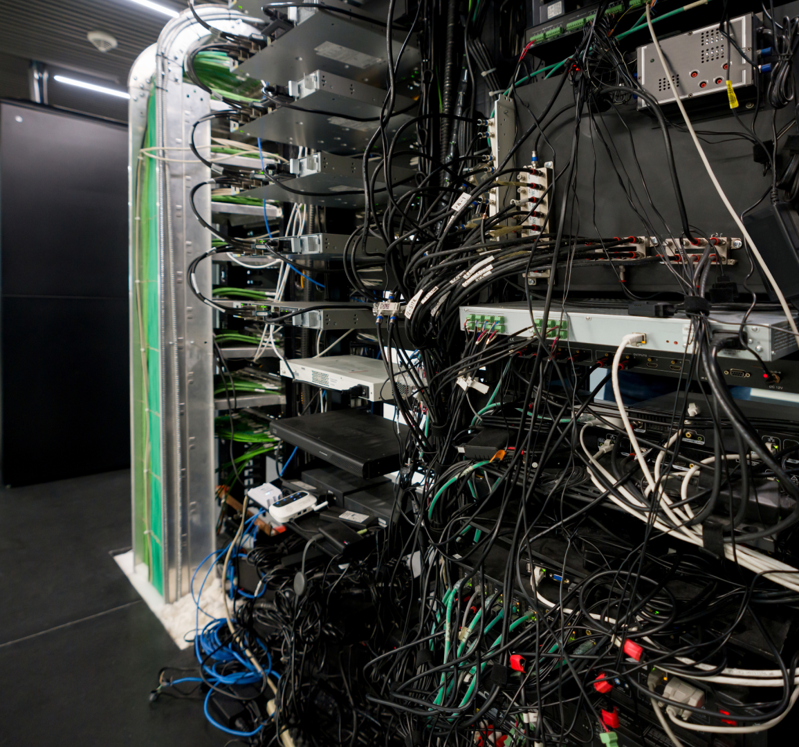 Data center server racks with cables.