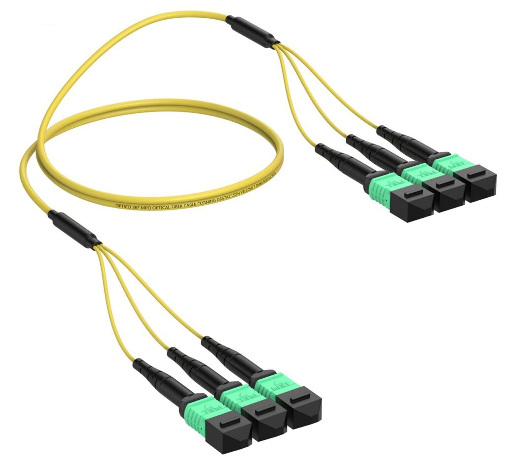 Yellow fiber optic cables with green connectors.
