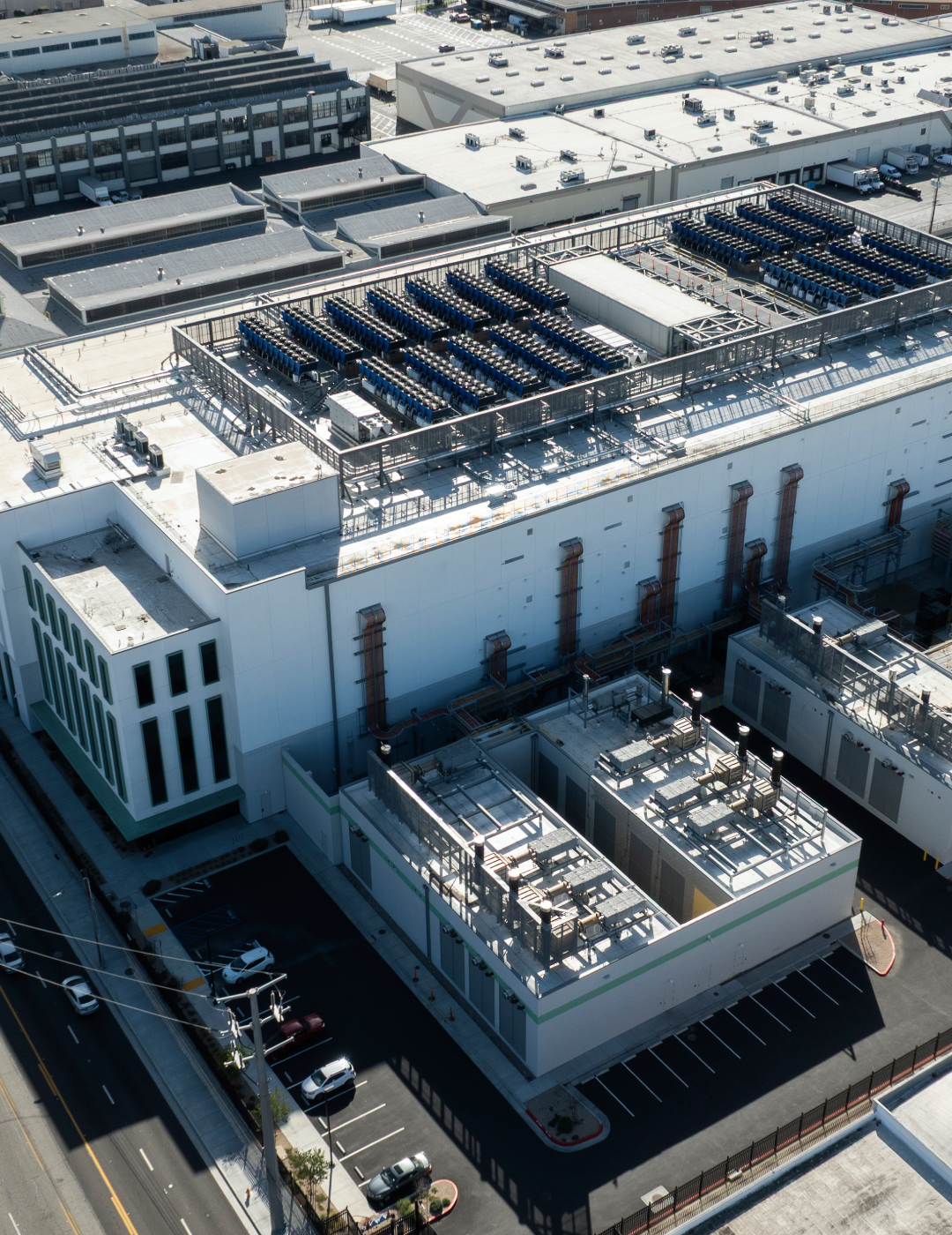 Industrial building with rooftop solar panels.