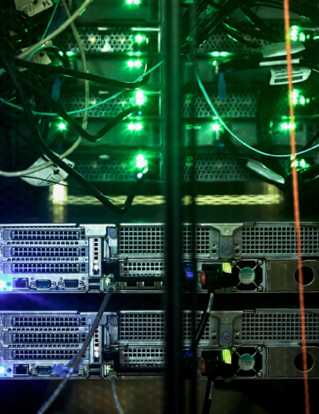 Server rack with glowing green lights.