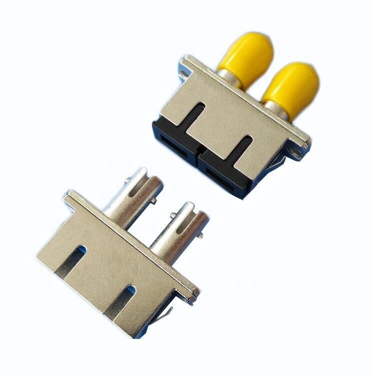Metal electrical connectors with yellow caps.