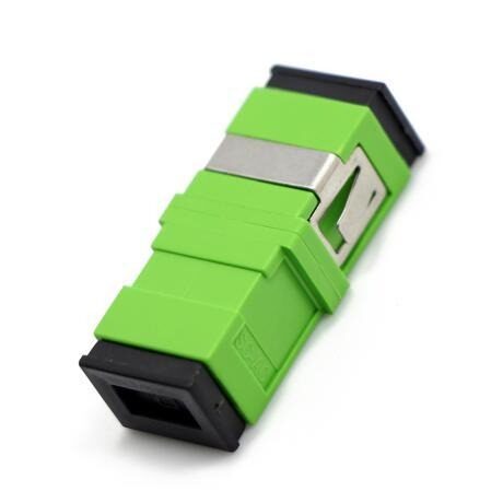 Green fiber optic adapter with black ends.