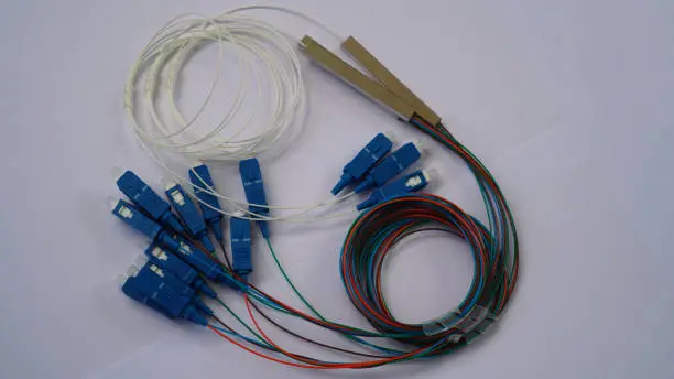 Fiber optic cables with blue connectors.